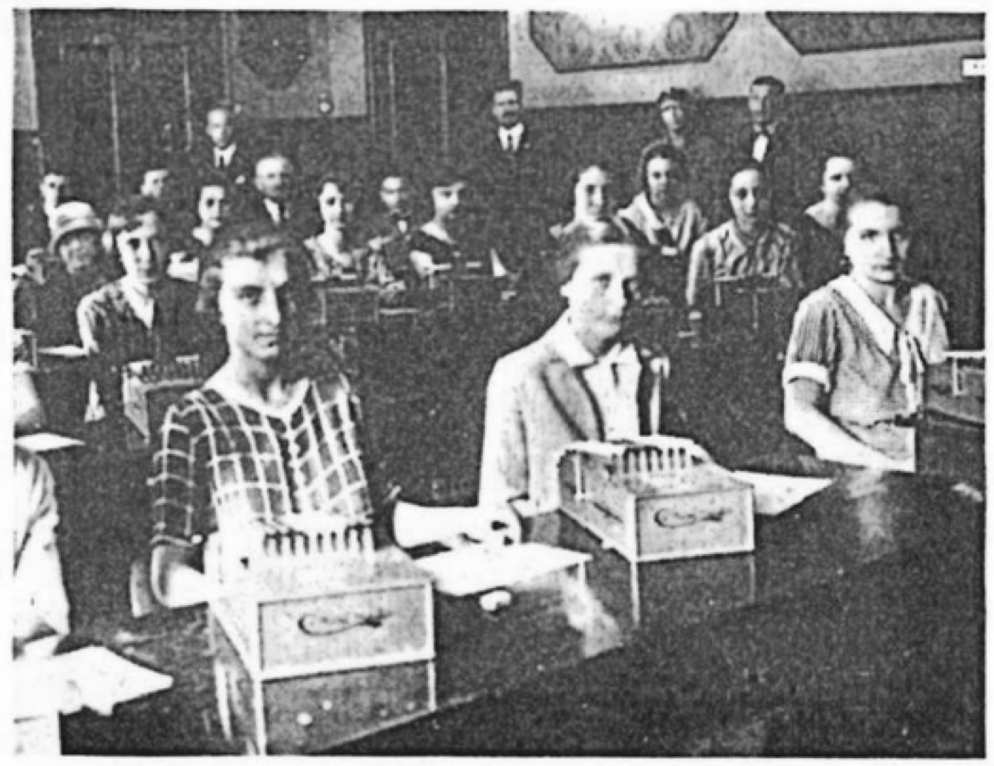 Rows of clerks at Comptometer adding machines in an office, 1926.
