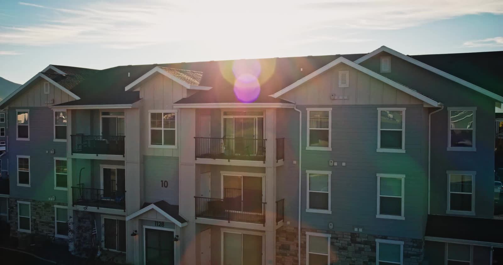 An apartment building at golden hour