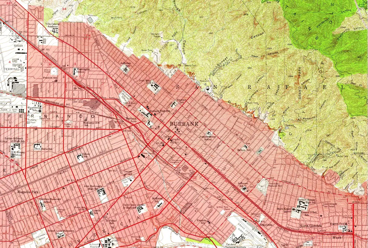A 1953 topographic map of Burbank: the street grid running up to the Verdugo Mountains, the rail line and the air terminal to the west.